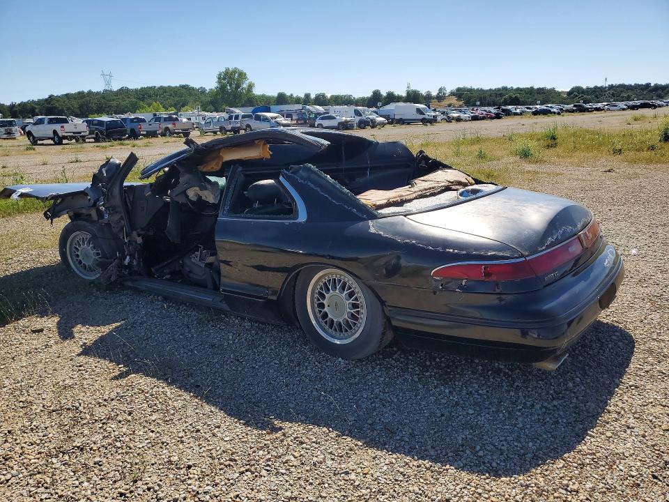 1995 Lincoln Mark series VIN 1LNLM91V4SY760187 COPART salvage auction — ALL OVER, Ca - Dis/Dlr/Exp Lien Papers-Salv, sold $50 on 2026-07-08 (photo 2)