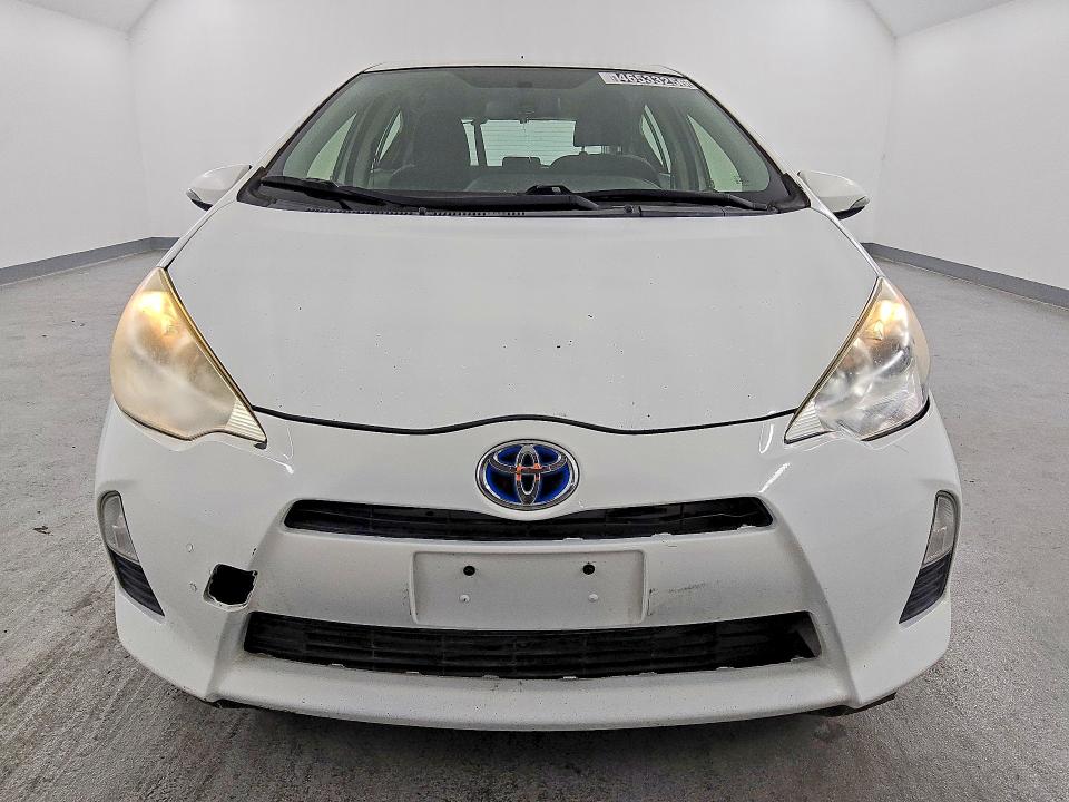 2012 Toyota Prius c VIN JTDKDTB38C1026463 COPART salvage auction — MINOR DENT/SCRATCHES, Ca - Lien Papers-Salvage Or Ac, sold $1,250 on 2026-07-02 (photo 5)