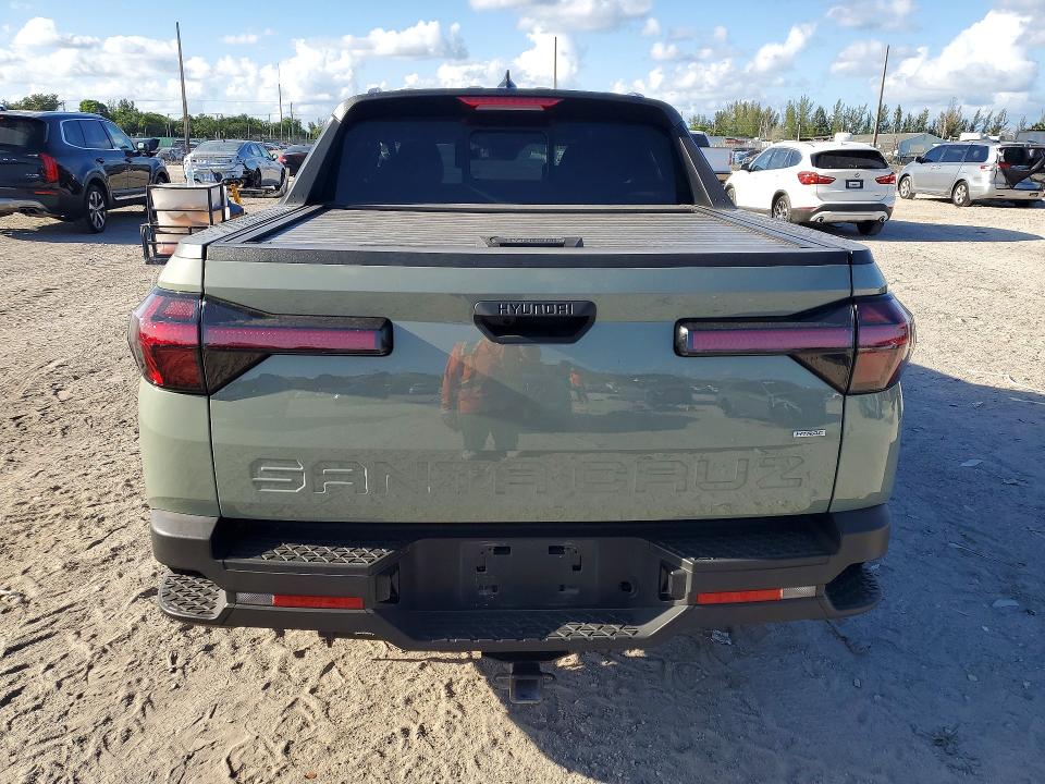 2023 Hyundai Santa cruz VIN 5NTJCDAE8PH040676 COPART salvage auction — SIDE, Fl - Cert Of Title Slvg Rebuildable, sold $9,200 on 2026-07-09 (photo 6)