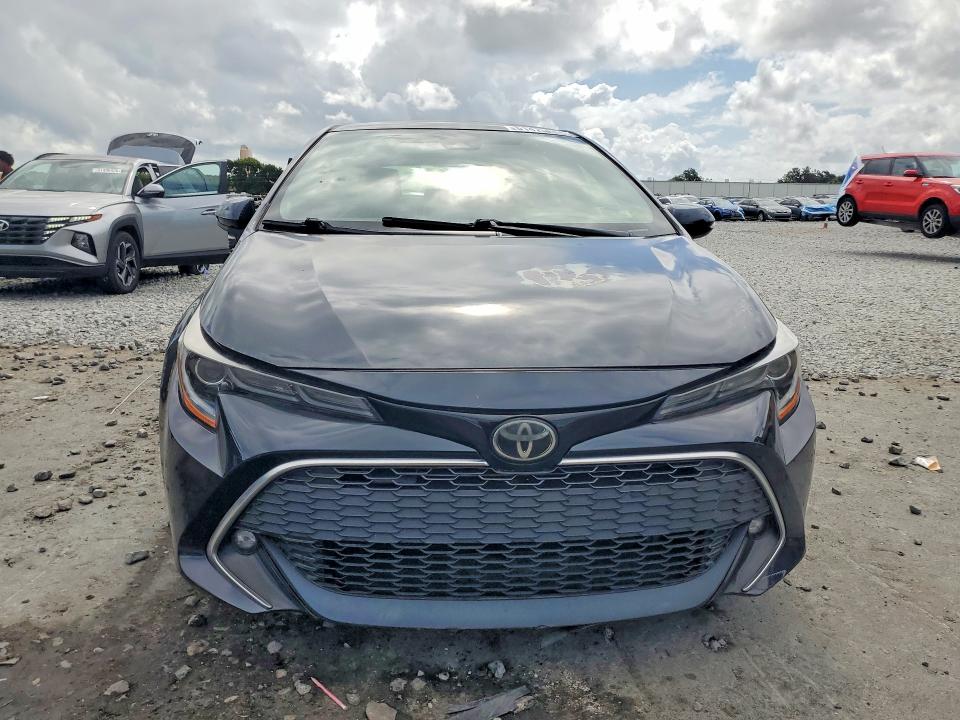 2019 Toyota Corolla VIN JTNK4RBE2K3042516 COPART salvage auction — MINOR DENT/SCRATCHES, Fl - Cert Of Title-Rebuilt (P), sold $8,400 on 2026-07-16 (photo 5)