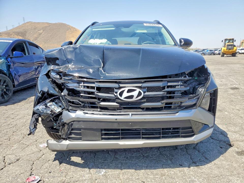 2026 Hyundai Tucson VIN 5NMJB3DE1TH678055 COPART salvage auction — NORMAL WEAR, FL - CERT OF TITLE SLVG REBUILDABLE (P), sold $9,500 on 2026-07-30 (photo 5)