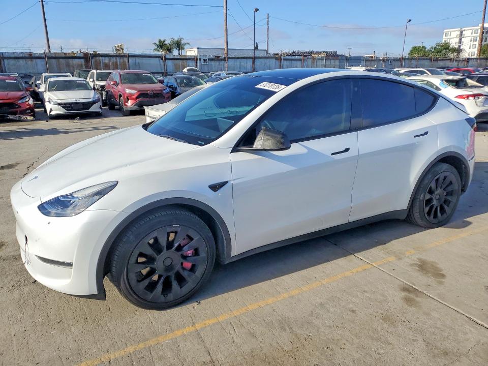 2023 Tesla Model y VIN 7SAYGDEE0PA052489 COPART salvage auction — REAR END, Ca - Salvage Certificate, sold $14,300 on 2026-07-29 (photo 1)