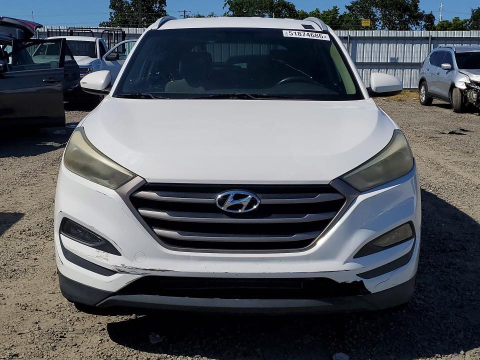 2016 Hyundai Tucson VIN KM8J33A48GU034233 COPART salvage auction — FRONT END, Fl - Dis/Dlr/Exp Only Clean Title, sold $2,500 on 2026-07-28 (photo 5)