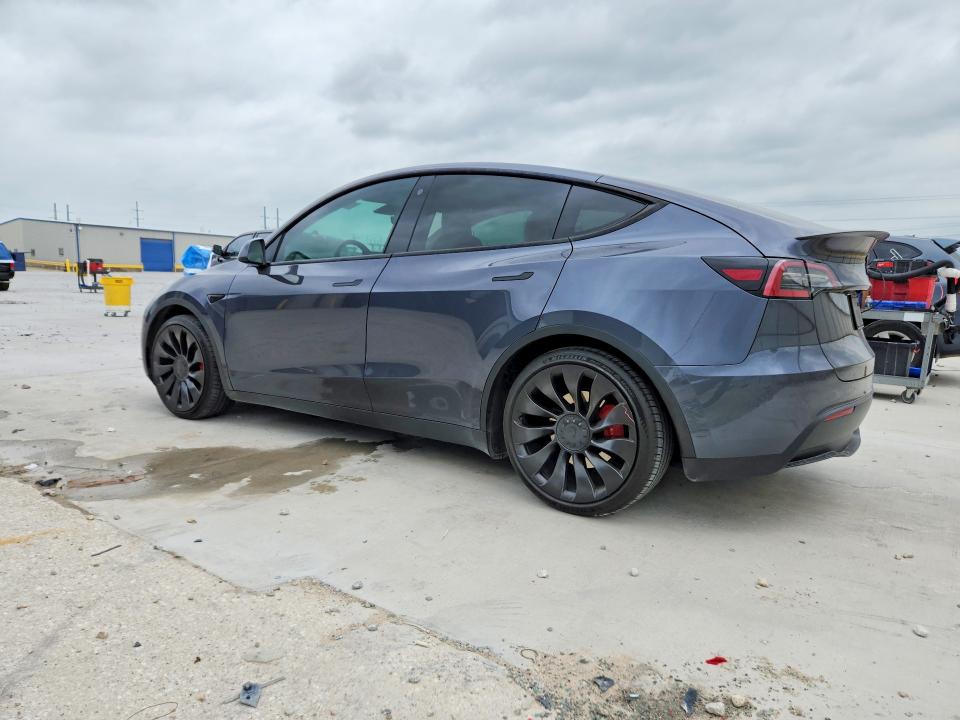 2023 Tesla Model y VIN 7SAYGDEF6PF620921 COPART salvage auction — FRONT END, Tx - Certificate Of Title, sold $5,100 on 2026-07-17 (photo 2)