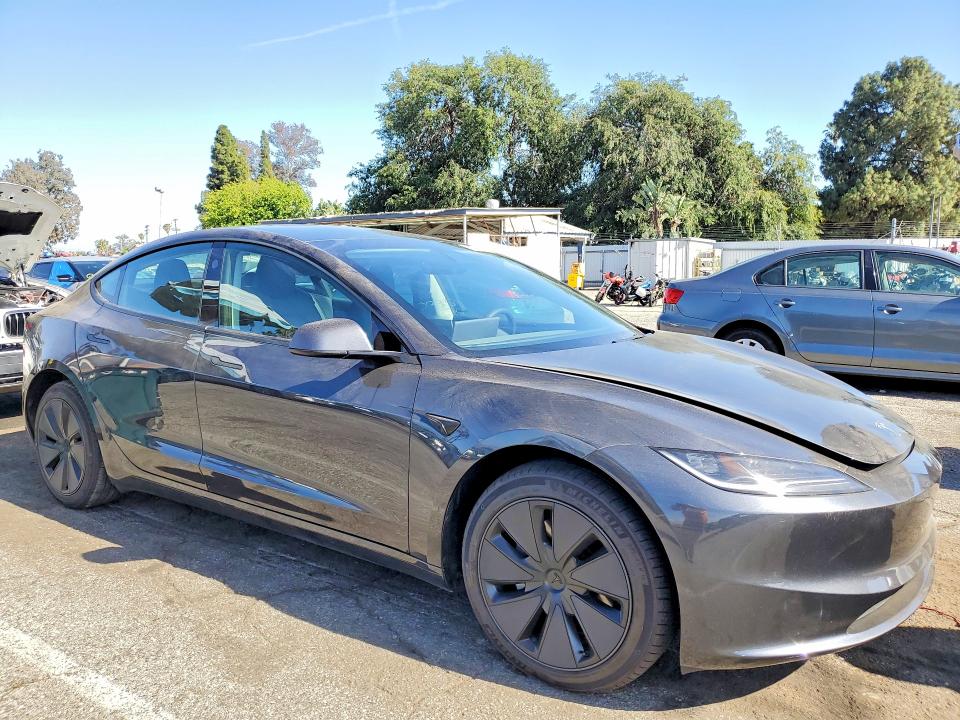 2025 Tesla Model 3 VIN 5YJ3E1EA9SF983285 COPART salvage auction — REAR END, Ca - Salvage Certificate, sold $11,000 on 2026-07-10 (photo 4)
