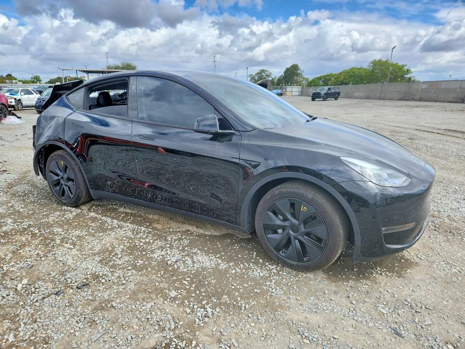 2025 Tesla Model y VIN 7SAYGAEE8SF259710 COPART salvage auction — REAR END, Ca - Salvage Certificate, sold $11,100 on 2026-07-31 (photo 4)
