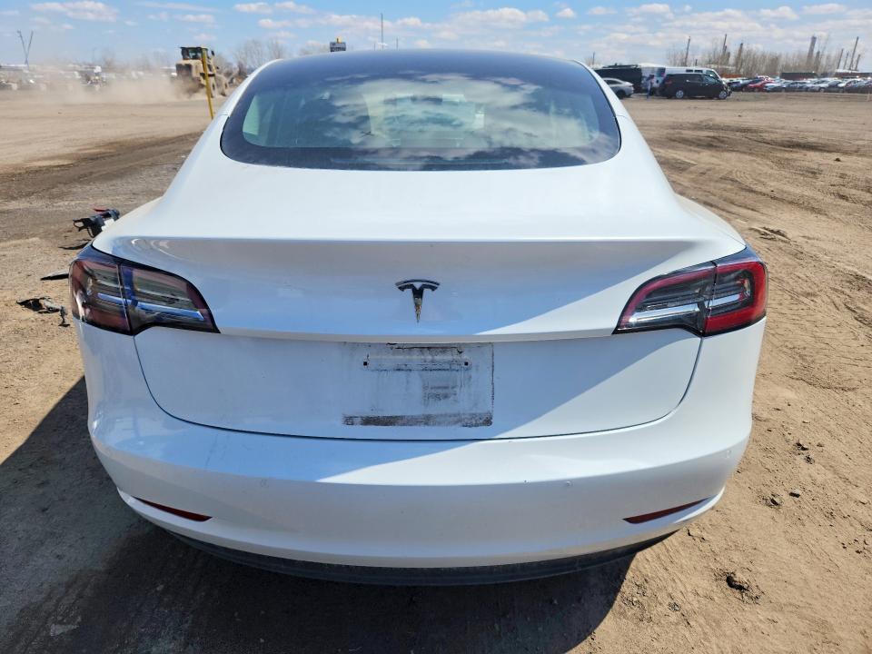 2021 Tesla Model 3 VIN 5YJ3E1EA9MF852621 COPART salvage auction — FRONT END, Qc - Gravement Accidente, sold $7,200 on 2026-09-08 (photo 6)