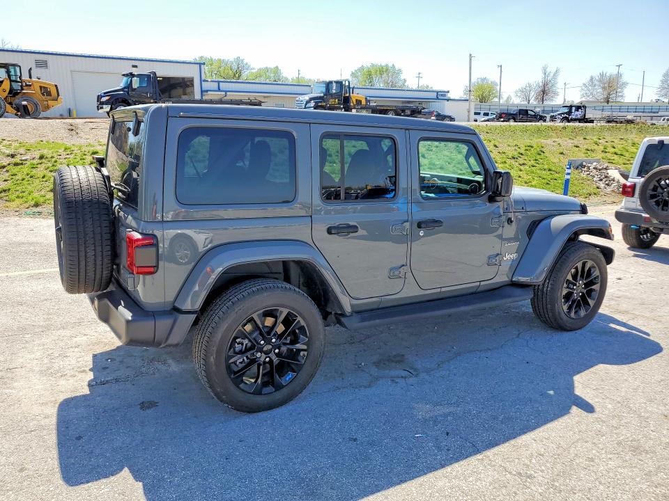 2023 Jeep Wrangler / VIN 1C4JJXP69PW604562 COPART salvage auction — MINOR DENT/SCRATCHES, MO - CERTIFICATE OF TITLE, sold $18,900 on 2026-07-09 (photo 3)