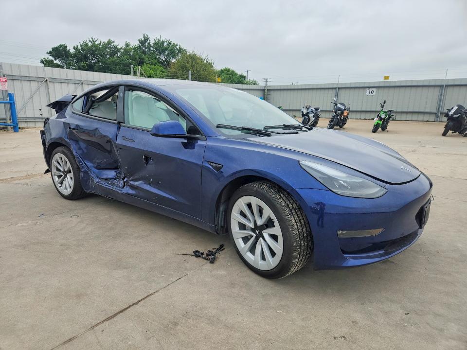 2023 Tesla Model 3 VIN 5YJ3E1EB2PF713492 COPART salvage auction — SIDE, Tx - Salvage Vehicle Title, sold $5,900 on 2026-07-06 (photo 4)