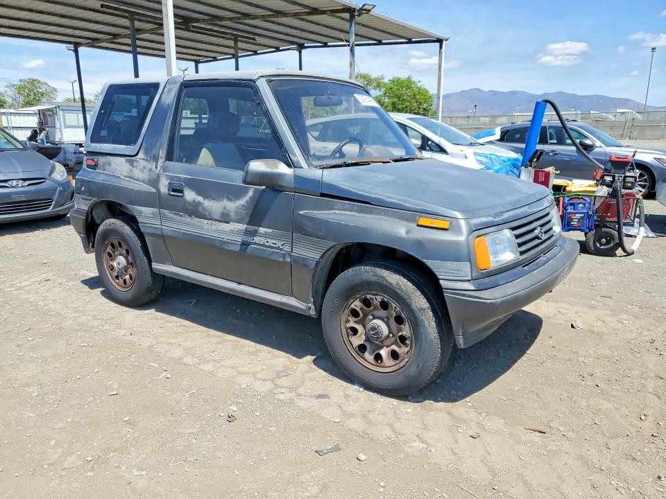 1989 Suzuki Sidekick VIN JS3TA01C5K4112583 COPART salvage auction — MINOR DENT/SCRATCHES, CA - DIS/DLR/EXP ONLY CLEAN TITLE, sold $1,700 on 2026-09-16 (photo 4)