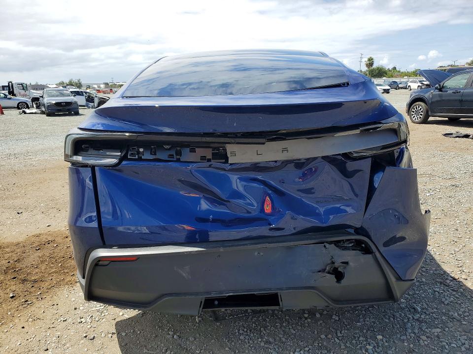 2026 Tesla Model y VIN 7SAYGDEE2TF609237 COPART salvage auction — REAR END, Ca - Salvage Certificate, sold $21,500 on 2026-07-10 (photo 6)