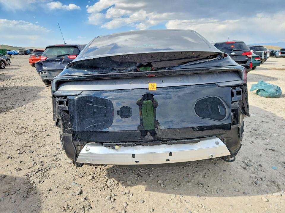 2026 Tesla Model y VIN 7SAYGDED0TF383478 COPART salvage auction — SIDE, Ut - Salvage Certificate, sold $14,900 on 2026-07-31 (photo 6)