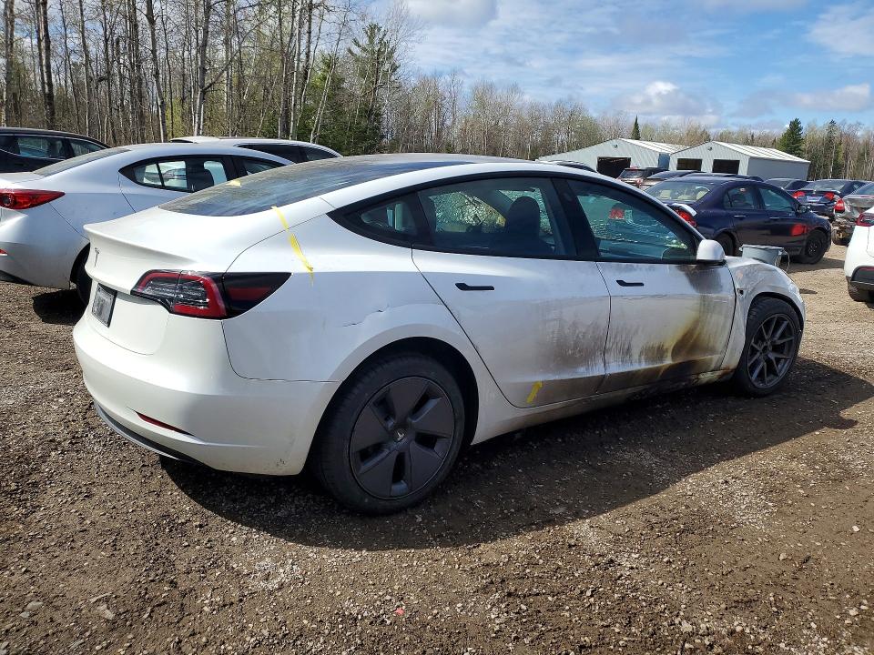 2023 Tesla Model 3 VIN 5YJ3E1EA5PF496852 COPART salvage auction — BURN, ON - PERMIT SALVAGE, sold $950 on 2026-08-25 (photo 3)