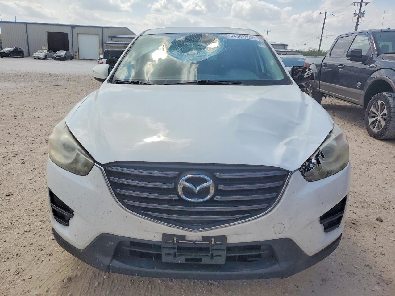 2016 Mazda CX-5 VIN JM3KE2BY7G0787412 COPART salvage auction — Front End, TX - SALVAGE VEHICLE TITLE (P), sold $3,100 on 2026-07-09 (photo 5)