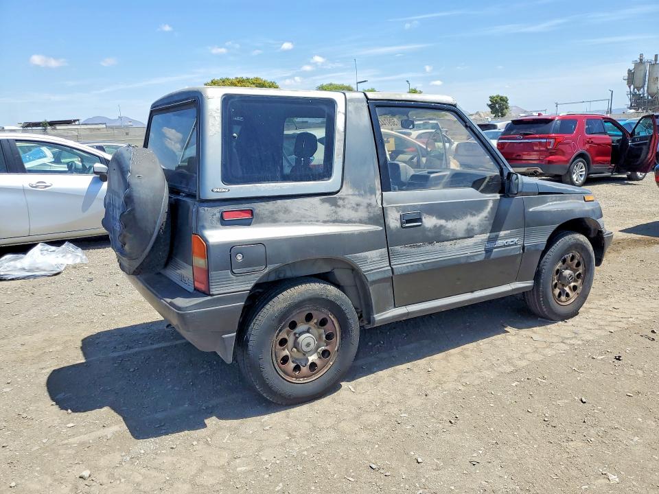 1989 Suzuki Sidekick VIN JS3TA01C5K4112583 COPART salvage auction — MINOR DENT/SCRATCHES, CA - DIS/DLR/EXP ONLY CLEAN TITLE, sold $1,700 on 2026-09-16 (photo 3)