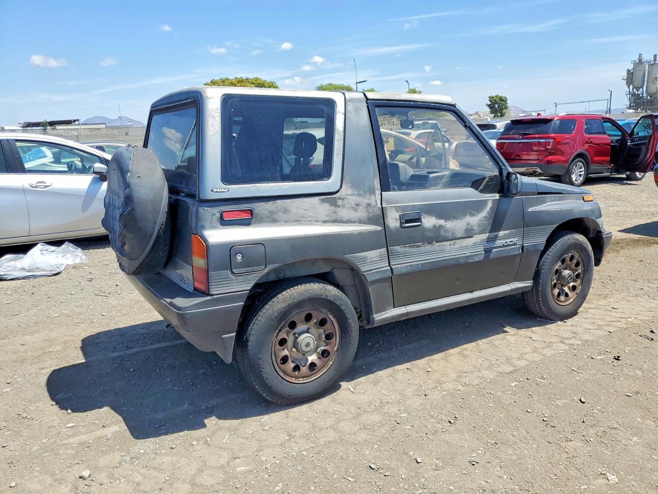 1989 Suzuki Sidekick VIN JS3TA01C5K4112583 COPART salvage auction — Minor Dent/Scratches, Dv - Clean Title, sold $1,350 on 2026-09-11 (photo 3)