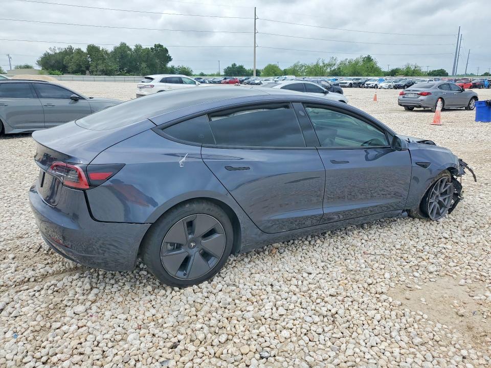 2023 Tesla Model 3 VIN 5YJ3E1EA4PF695178 COPART salvage auction — SIDE, TX - SALVAGE VEHICLE TITLE, sold $3,450 on 2026-07-02 (photo 3)