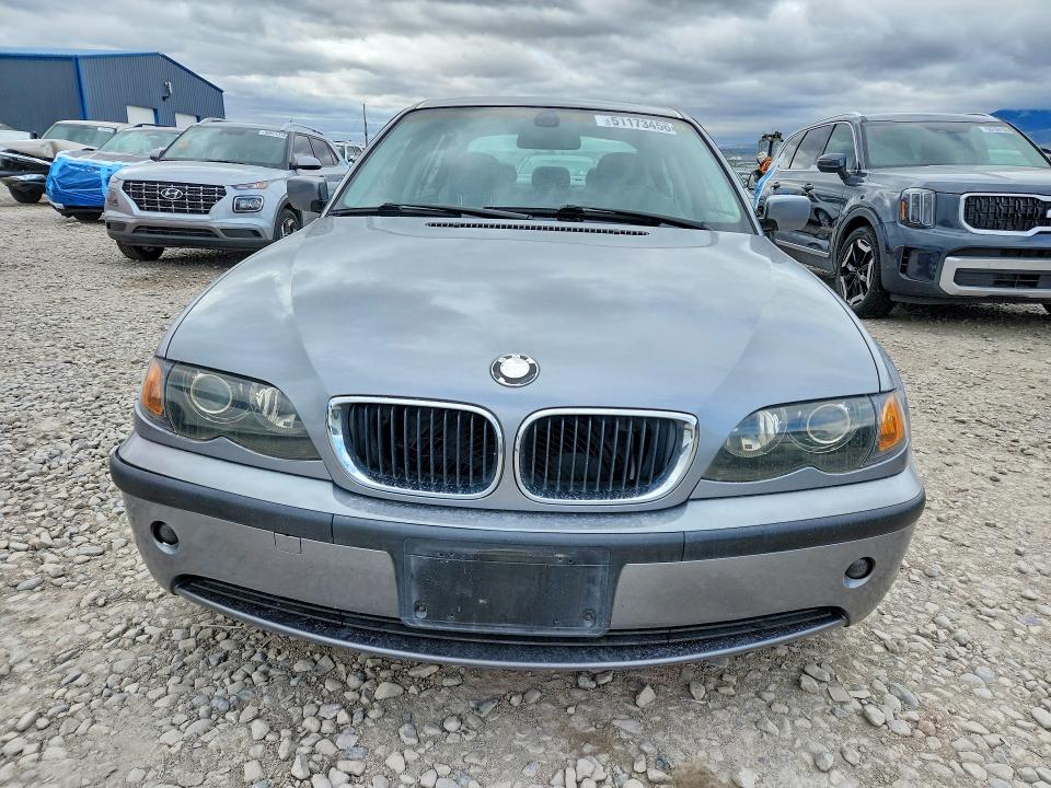 2004 BMW 3 series VIN WBAAZ33474KP84811 COPART salvage auction — MINOR DENT/SCRATCHES, Tx - Salvage Vehicle Title, sold $325 on 2026-07-31 (photo 5)
