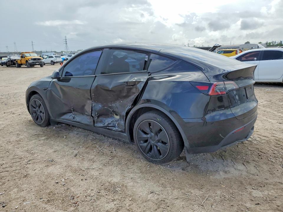 2023 Tesla Model y VIN 7SAYGDEE5PA054822 COPART salvage auction — SIDE, Tx - Salvage Vehicle Title, sold $11,800 on 2026-07-03 (photo 2)