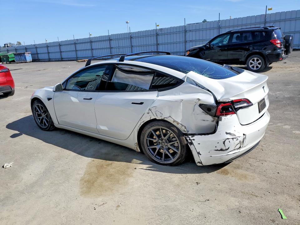 2022 Tesla Model 3 VIN 5YJ3E1EA7NF374670 COPART salvage auction — SIDE, Salvage Title, sold $2,700 on 2026-07-16 (photo 2)