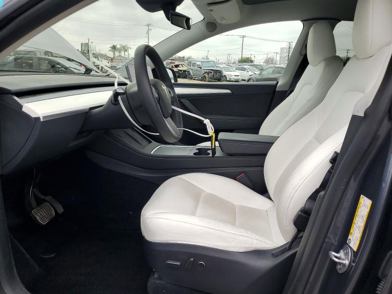 2023 Tesla Model y VIN 7SAYGDEE1PA198593 COPART salvage auction — REAR END, Ca - Salvage Certificate, sold $13,100 on 2026-07-09 (photo 7)