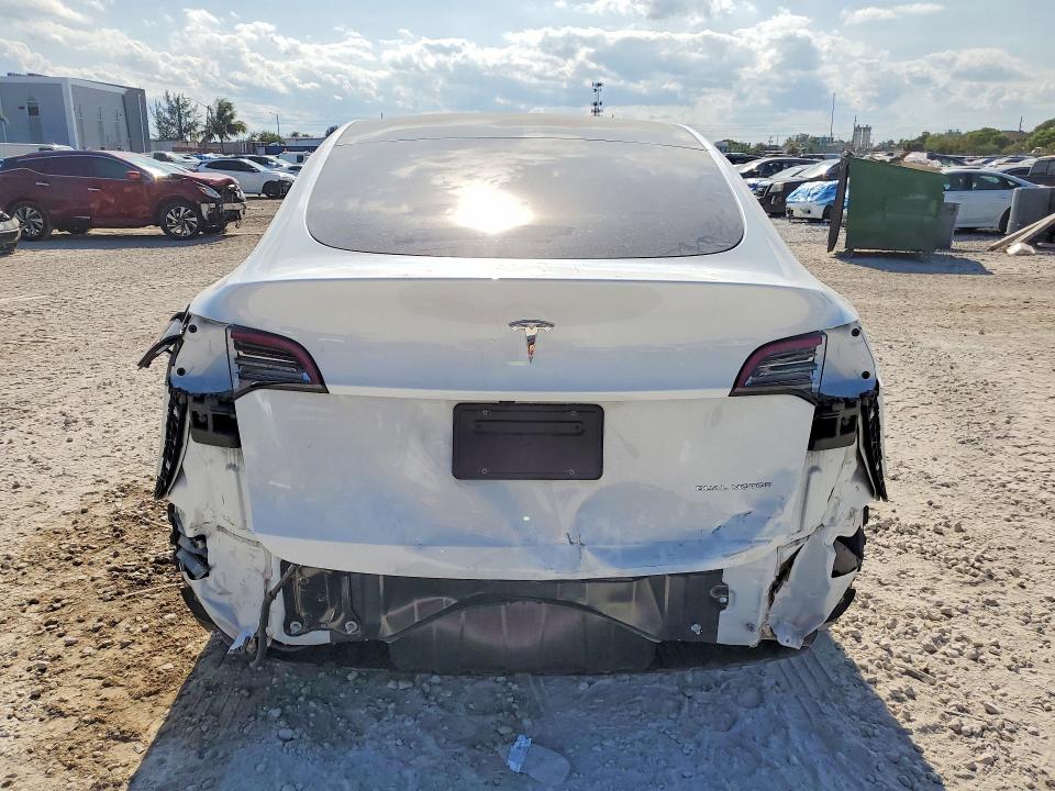 2023 Tesla Model y VIN 7SAYGDEE7PF880185 COPART salvage auction — REAR END, FL - CERT OF TITLE SLVG REBUILDABLE, sold $9,100 on 2026-07-28 (photo 6)