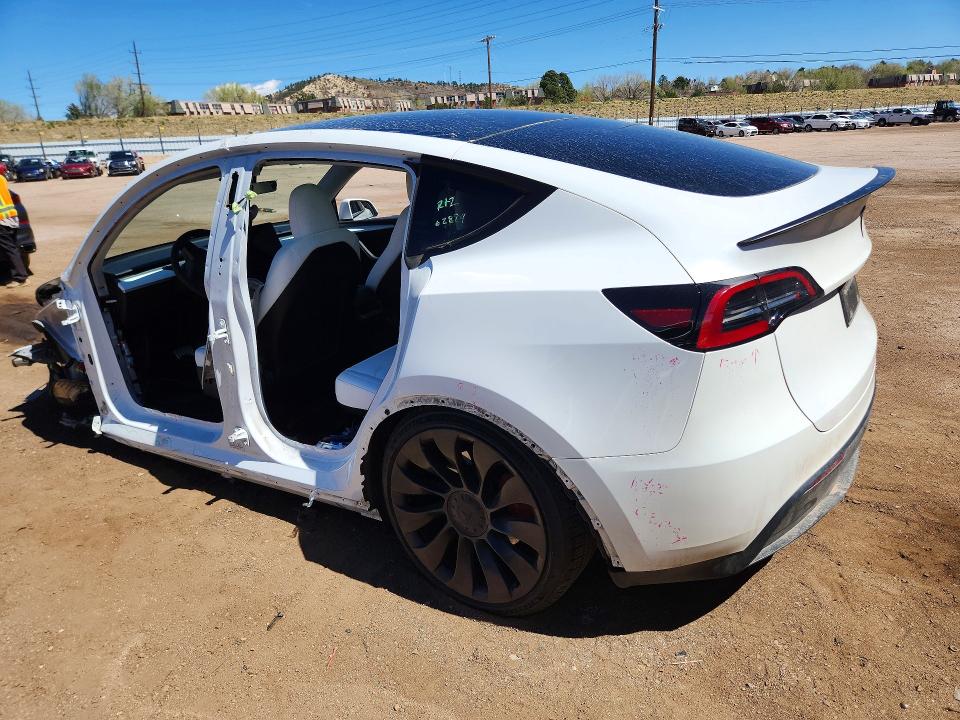 2023 Tesla Model y VIN 7SAYGDEF6PF936786 COPART salvage auction — SIDE, Co - Salvage Title, sold $11,100 on 2026-07-06 (photo 2)