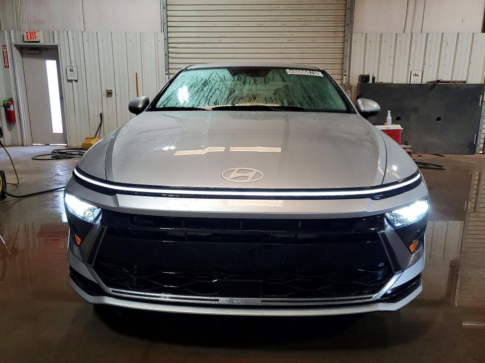 2025 Hyundai Sonata VIN KMHL64JA4SA469028 COPART salvage auction — HAIL, Fl - Certificate Of Title, sold $15,000 on 2026-07-13 (photo 5)