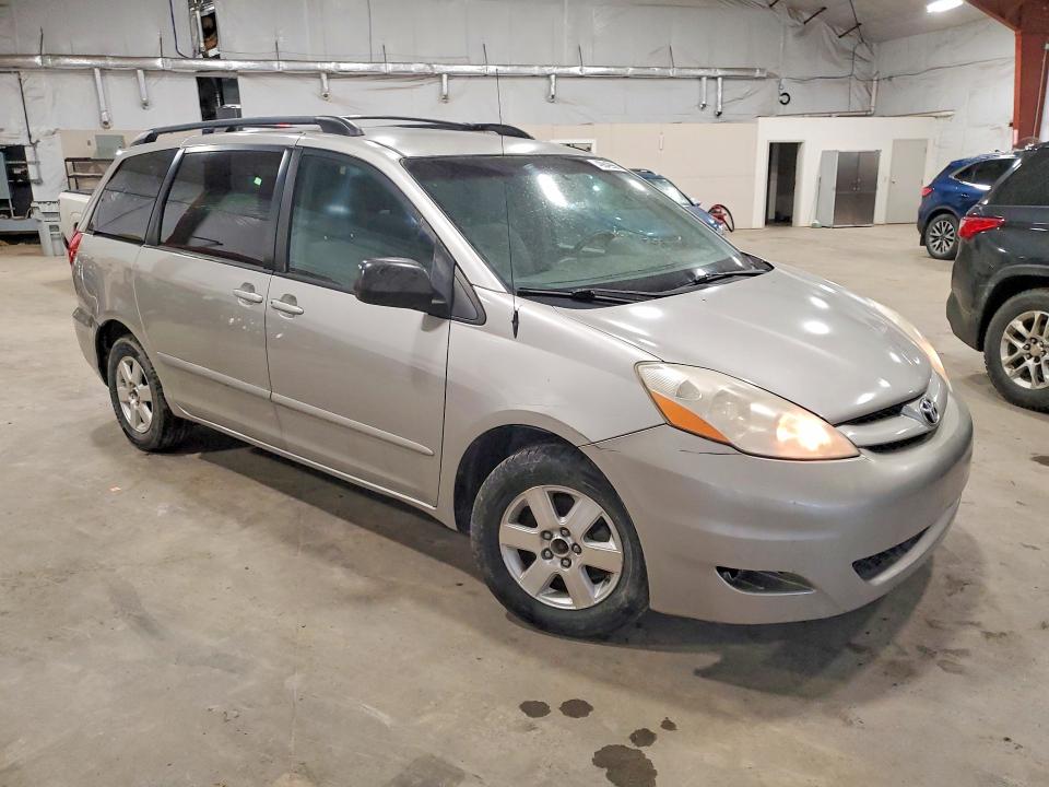 2010 Toyota Sienna VIN 5TDKK4CC8AS316857 COPART salvage auction — REAR END, TX - SALVAGE VEHICLE TITLE, sold $1,850 on 2026-07-13 (photo 4)