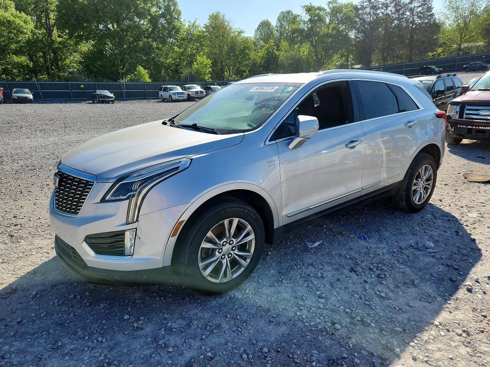 2020 Cadillac Xt5 VIN 1GYKNBR42LZ148866 COPART salvage auction — MINOR DENT/SCRATCHES, Fl - Certificate Of Title (P), sold $7,100 on 2026-07-09 (photo 1)