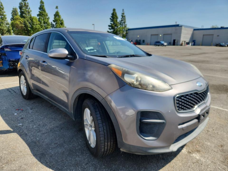 2019 Kia Sportage VIN KNDPM3AC5K7512991 COPART salvage auction — MINOR DENT/SCRATCHES, CA - SALVAGE CERTIFICATE, sold $2,300 on 2026-07-30 (photo 4)