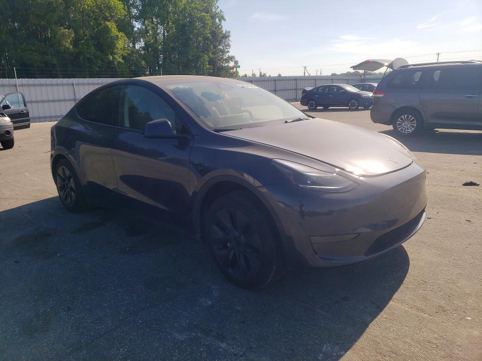 2025 Tesla Model y VIN 7SAYGDED6SA371234 COPART salvage auction — SIDE, Nc - Salvage Certificate Of Title, sold $375 on 2026-07-30 (photo 4)