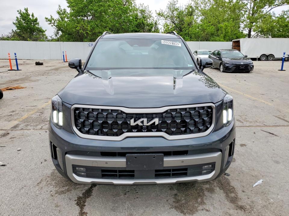 2023 Kia Telluride VIN 5XYP5DGC6PG382112 COPART salvage auction — MINOR DENT/SCRATCHES, MO - CERTIFICATE OF TITLE, sold $32,000 on 2026-07-02 (photo 5)