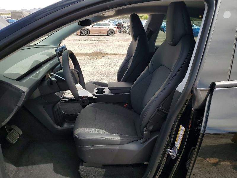 2026 Tesla Model y VIN 7SAYGDED7TA595033 COPART salvage auction — SIDE, Nv - Salvage Title, sold $17,100 on 2026-07-02 (photo 7)