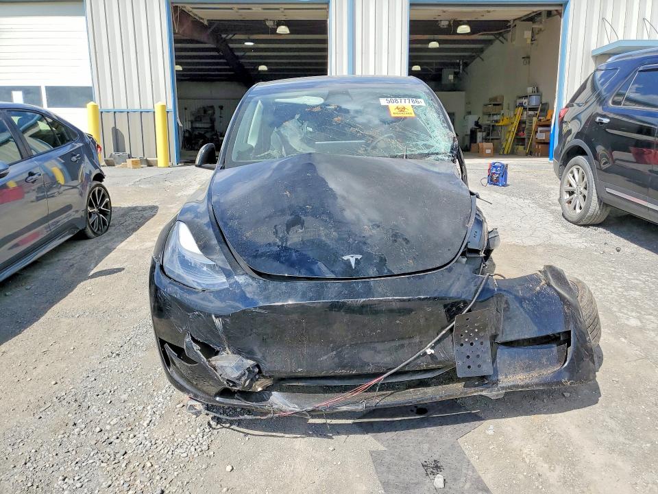 2023 Tesla Model y VIN 7SAYGDEF7PF604890 COPART salvage auction — ALL OVER, Va - Cert Of Title - Salvage, sold $1,800 on 2026-07-06 (photo 5)
