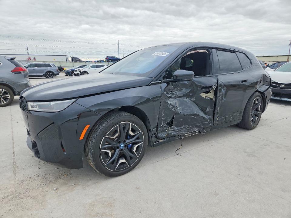 2025 BMW Ix VIN WB533CF00SCT39190 COPART salvage auction — SIDE, Tx - Certificate Of Title, sold $28,250 on 2026-07-28 (photo 1)
