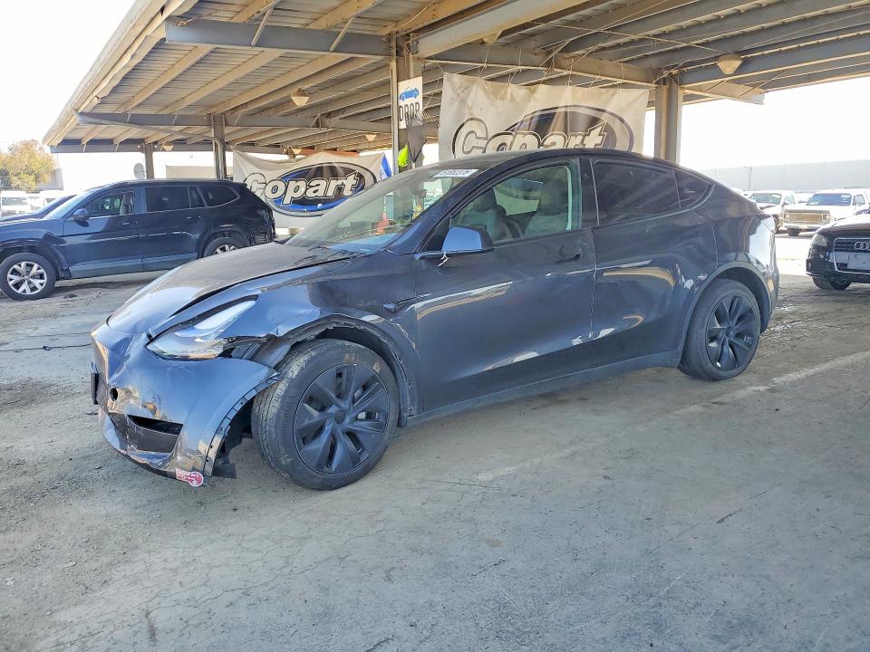 2024 Tesla Model y VIN 7SAYGAEE8RF100115 COPART salvage auction — FRONT END, Ca - Salvage Certificate, sold $12,200 on 2026-07-14 (photo 1)