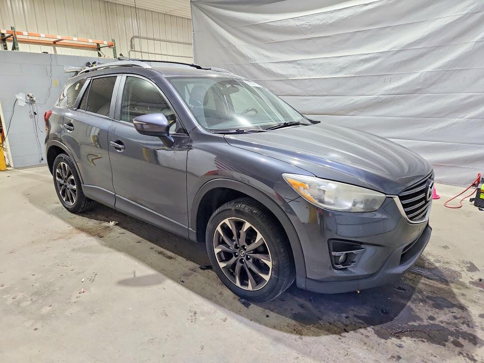2016 Mazda Cx-5 VIN JM3KE4DY1G0795935 COPART salvage auction — SIDE, Nh - Cert Of Title-Salvage, sold $2,200 on 2026-07-28 (photo 4)