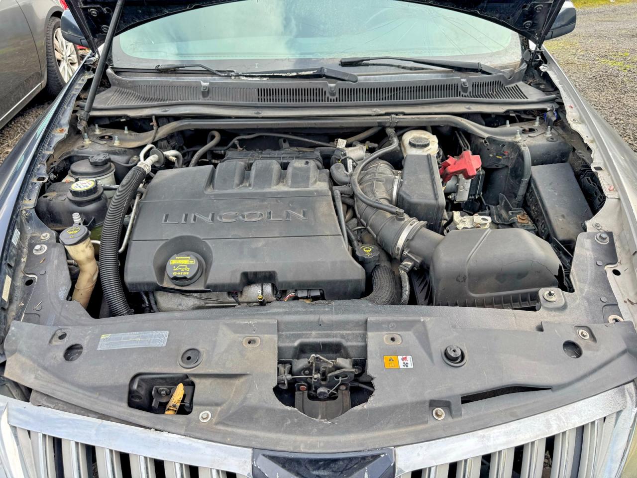 2009 Lincoln MKS VIN 1LNHM94RX9G608922 COPART salvage auction — Vandalized, OR - SALVAGE TITLE CERTIFICATE (P), sold $2,300 on 2026-05-18 (photo 7)