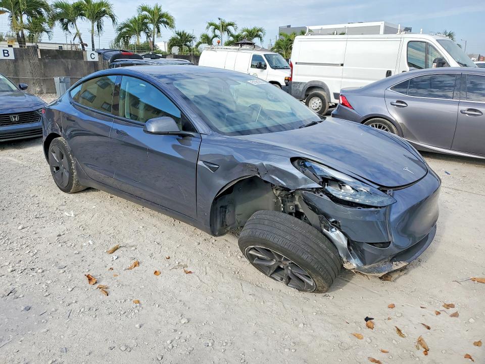 2023 Tesla Model 3 VIN 5YJ3E1EAXPF672312 COPART salvage auction — FRONT END, FL, sold $7,700 on 2026-07-24 (photo 4)