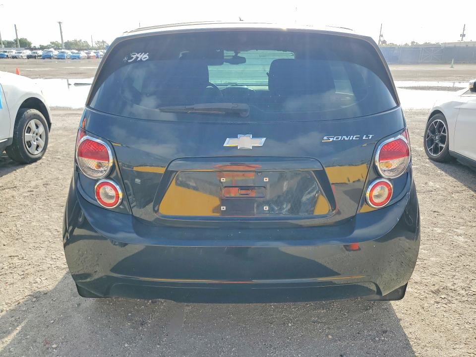 2015 Chevrolet SONIC VIN 1G1JC6SH5F4147569 COPART salvage auction — MINOR DENT/SCRATCHES, Fl - Cert Of Title-Slvg Rebld Flood, sold $950 on 2026-07-21 (photo 6)