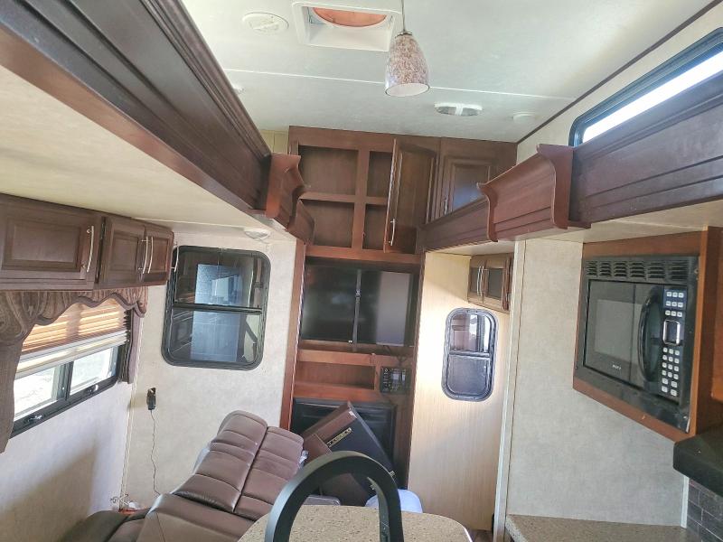 2015 Cougar Keystone VIN 4YDF33822F2500423 COPART salvage auction — SIDE, TX - SALVAGE VEHICLE TITLE, sold $70 on 2026-07-30 (photo 6)