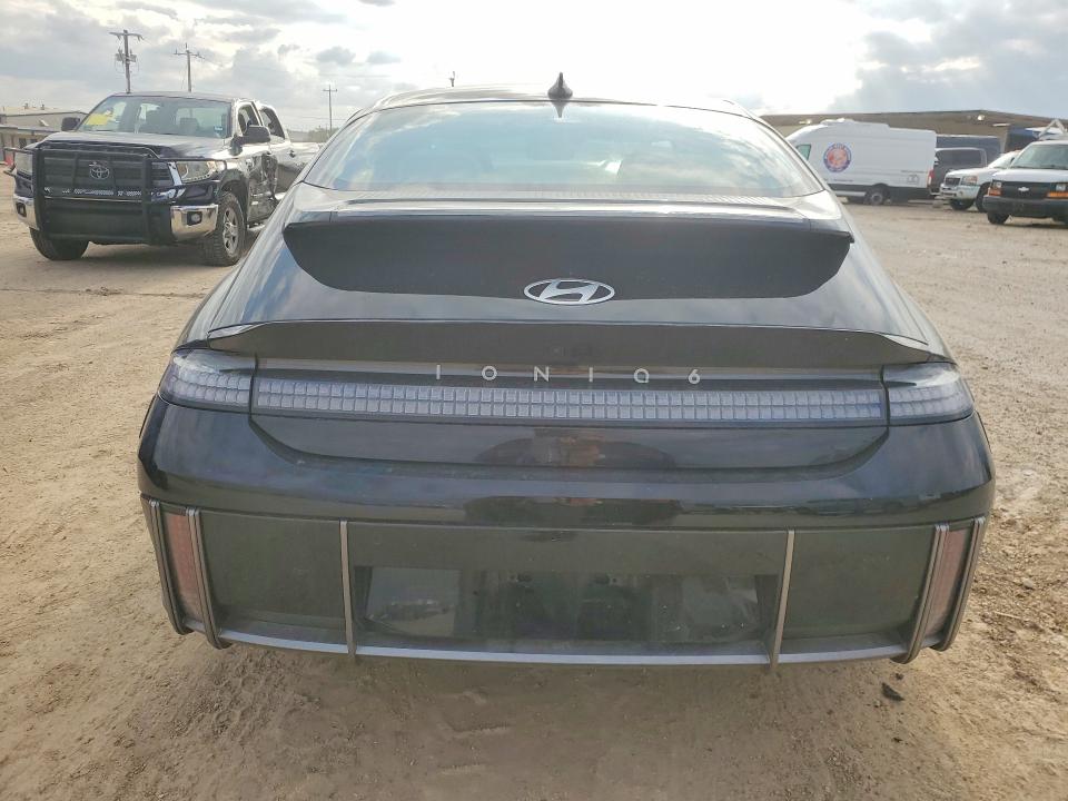 2025 Hyundai Ioniq 6 VIN KMHM54AA2SA095865 COPART salvage auction — SIDE, TX - SALVAGE VEHICLE TITLE, sold $14,500 on 2026-07-30 (photo 6)