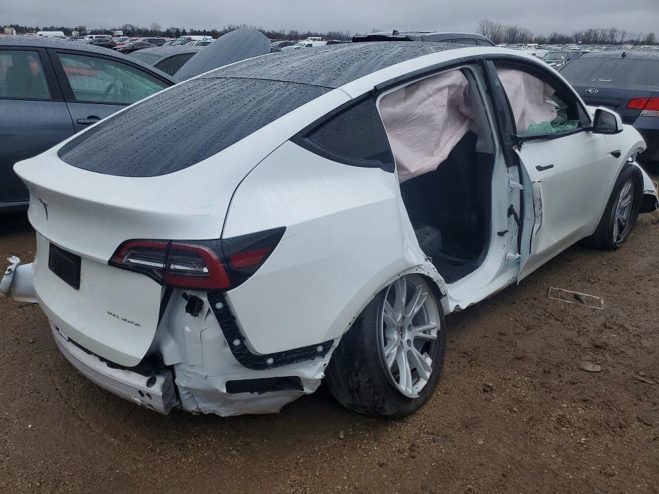 2023 Tesla Model y VIN 7SAYGDEEXPF809921 COPART salvage auction — ALL OVER, Il - Salvage Certificate, sold $1,650 on 2026-07-07 (photo 3)