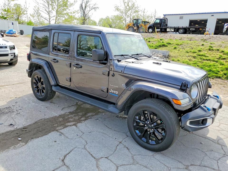 2022 Jeep Wrangler unlimited VIN 1C4JJXP6XNW276002 COPART salvage auction — MINOR DENT/SCRATCHES, MO - CERTIFICATE OF TITLE, sold $20,000 on 2026-07-16 (photo 4)