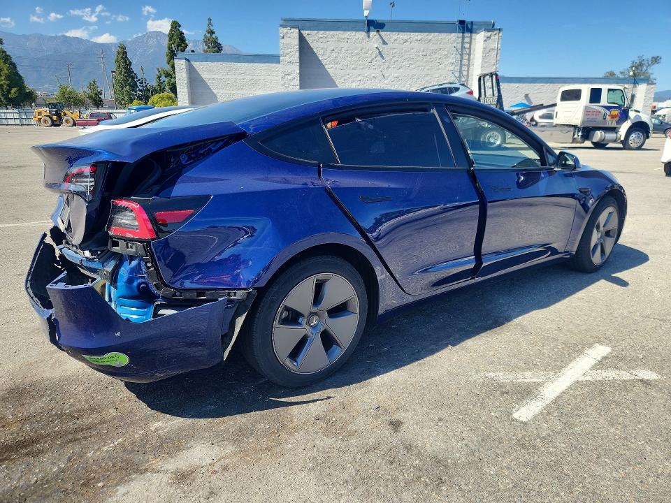2023 Tesla Model 3 VIN 5YJ3E1EA6PF463312 COPART salvage auction — REAR END, Ca - Salvage Certificate, sold $4,400 on 2026-07-02 (photo 3)