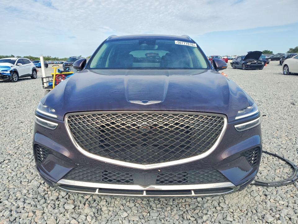 2022 Genesis Gv70 VIN KMUMADTBXNU023043 COPART salvage auction — SIDE, Salvage Title, sold $13,000 on 2026-07-17 (photo 5)