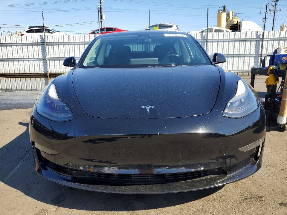 2023 Tesla Model 3 VIN 5YJ3E1EA8PF562228 COPART salvage auction — REAR END, Ca - Salvage Certificate, sold $6,000 on 2026-07-06 (photo 5)