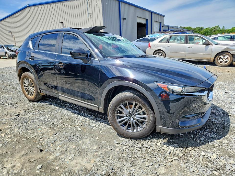 2021 Mazda Cx-5 VIN JM3KFBCM9M0453970 COPART salvage auction — ROLLOVER, GA - CERT OF TITLE-SALVAGE, sold $2,600 on 2026-07-30 (photo 4)