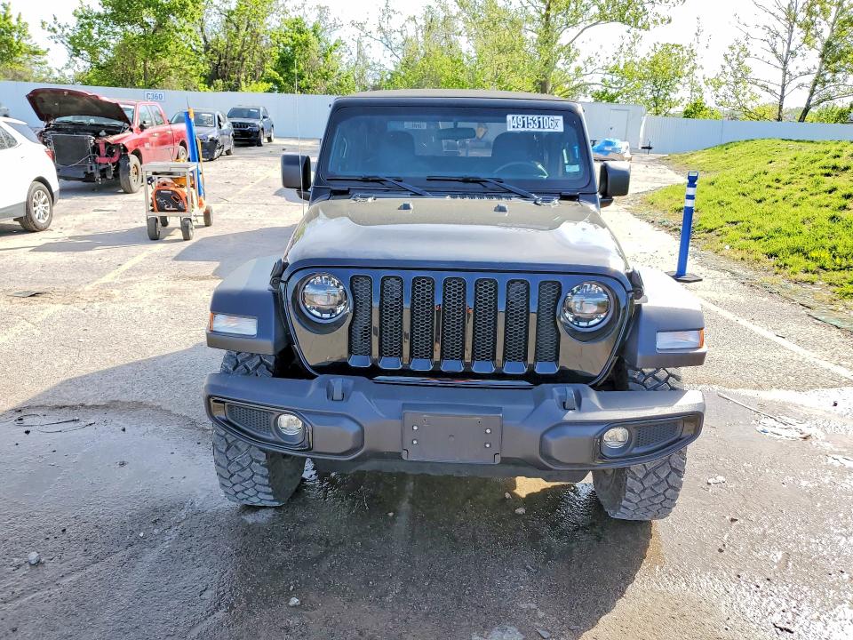2021 Jeep Wrangler / VIN 1C4GJXAN3MW756584 COPART salvage auction — MINOR DENT/SCRATCHES, MO - CERTIFICATE OF TITLE, sold $17,300 on 2026-07-09 (photo 5)